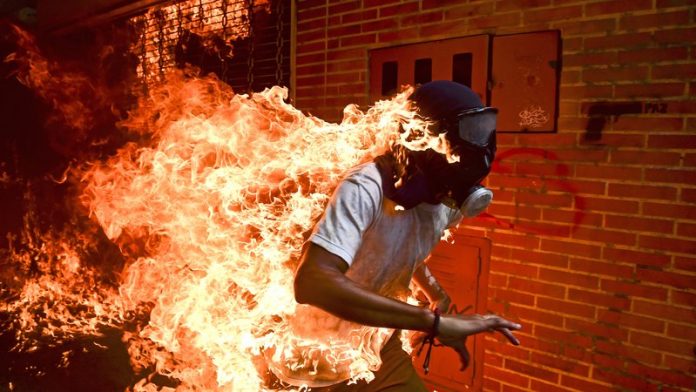 ‘Burning man’ photo wins top image prize