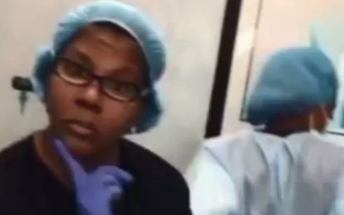 Doctor who danced during surgery is suspended, Report