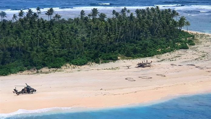 'SOS' in the sand saves Pacific island mariners (Photo)