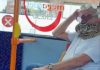 Man 'wears' snake as face mask on bus (Video)