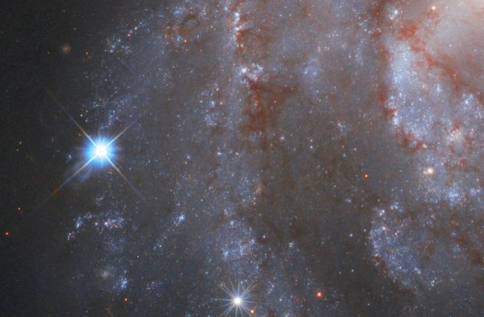 NASA's Hubble Telescope caught a supernova outshining every star in its galaxy