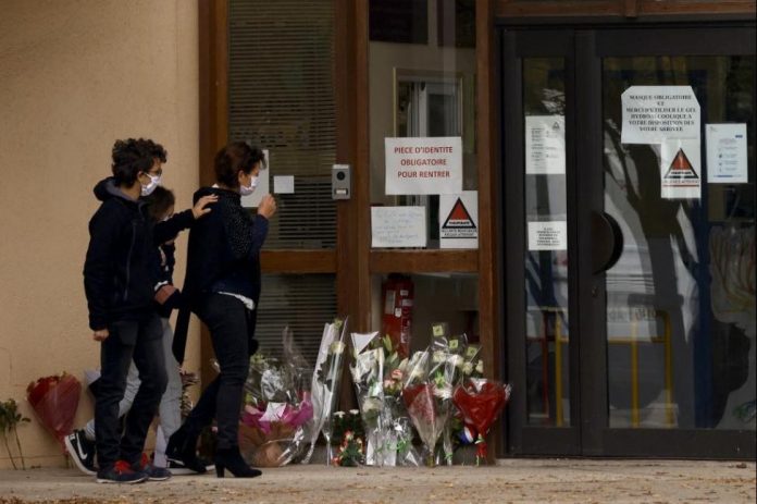 Police arrest nine after teacher beheaded in Paris suburb, Report