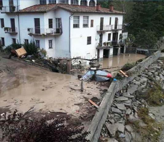 Two dead, 24 missing after floods in France and Italy Two dead, 24 missing after floods in France and Italy
