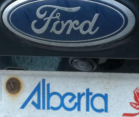 Alberta to end use of licence plate stickers, Report Alberta to end use of licence plate stickers, Report