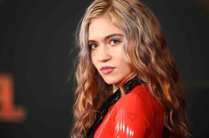 Elon Musk's Girlfriend, Singer Grimes Contracts COVID-19, Report