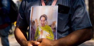 Detained Aung San Suu Kyi charged with violating import laws in Myanmar Detained Aung San Suu Kyi charged with violating import laws in Myanmar