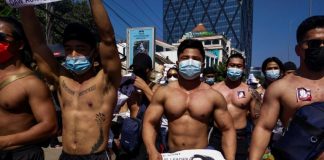 Macho macho man: Myanmar’s shirtless gym junkies join anti-coup rally, Report Macho macho man: Myanmar's shirtless gym junkies join anti-coup rally, Report