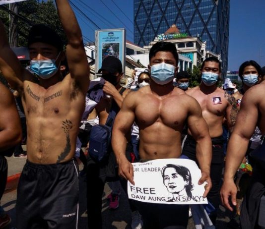 Macho macho man: Myanmar’s shirtless gym junkies join anti-coup rally, Report Macho macho man: Myanmar's shirtless gym junkies join anti-coup rally, Report