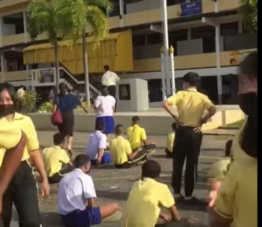 Students flee as headmaster pulls out gun during school assembly (Video) Students flee as headmaster pulls out gun during school assembly (Video)