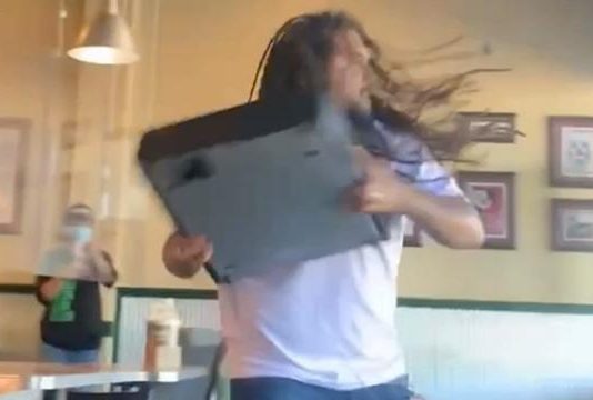 Angry customer throws cash register through window (Video) Angry customer throws cash register through window
