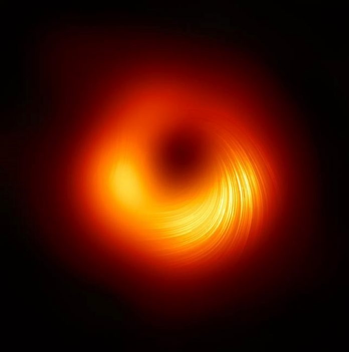 Scientists show magnetic fields around black hole in image for first time
