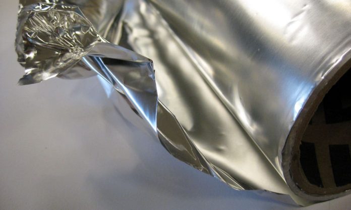 Why does household aluminium foil have one dull side and one shiny side?