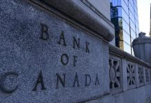 Bank of Canada keeps key interest rate target on hold at 0.25 percent