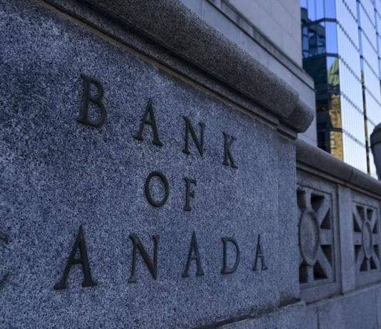 Bank of Canada keeps key interest rate target on hold at 0.25 percent