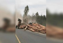 RCMP: On-ramp closed near Cumberland after logging truck overturns onto vehicle